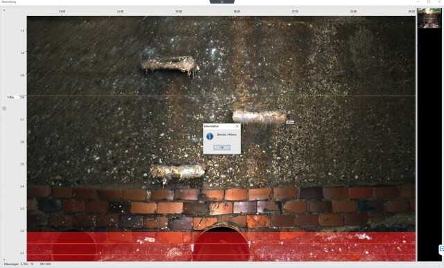 Abb. 4: Ansicht der Software IKAS evolution: Abwicklung des Schachtes mit Messung auf der Schachtwand. Für die Breite des Steigeisens wurde eine Strecke (rote Linie) von 240 mm ermittelt.