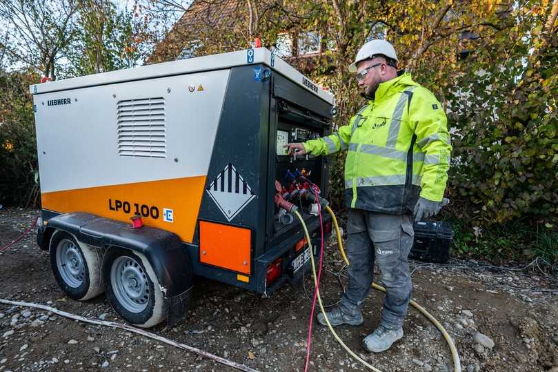 Der mobile Energiespeicher von Liebherr versorgt auf der Baustelle den 3D-Drucker – CO₂-Emissionen und Lärmbelastung werden signifikant reduziert. | Foto: Heidelberg Materials/