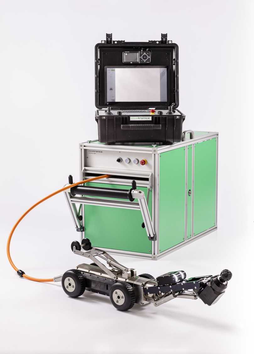 Das komplette eCutter light-System: kompakt, elektrisch und mobil – bestehend aus Roboter, Kabeltrommel und Bedienkoffer, alles transportfähig im Pkw. | Foto: Pipetronics