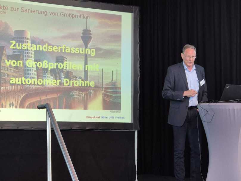 Michael Schoppen berichtete über den Einsatz einer autonom fliegenden Drohne im Düsseldorfer Kanalnetz. | Foto: B_I/zu Eulenburg