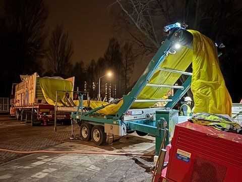 Liner-Einbau über ein Förderband | Foto: Impreg Liner-Einbau über ein Förderband | Foto: Impreg