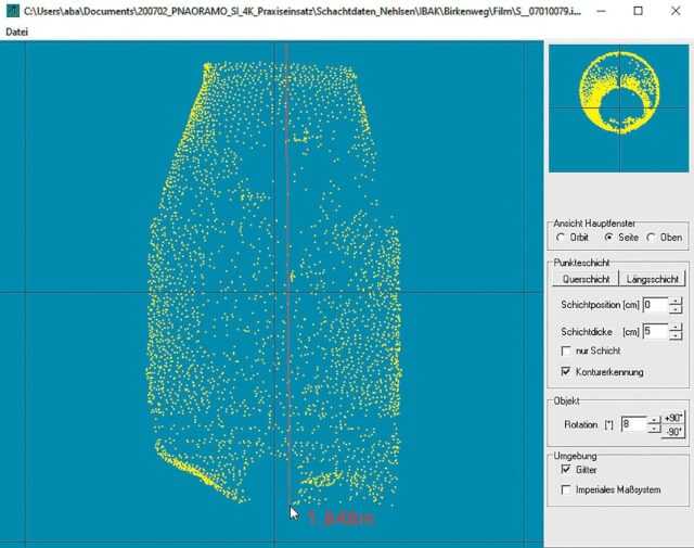 Abb. 5: Punktwolke in der Seitenansicht mit Ergebnis einer Tiefenmessung: Die Messstrecke (rote Linie) wird neben dem Mauszeiger mit 1,848 m angegeben.